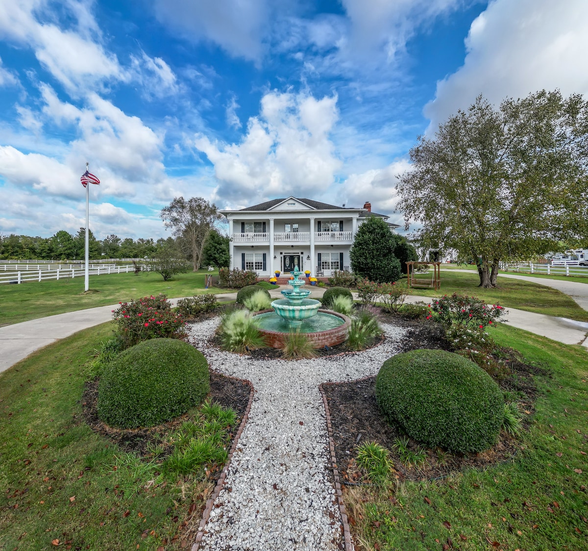 Front fountain and two-story estate house at Parkton Place