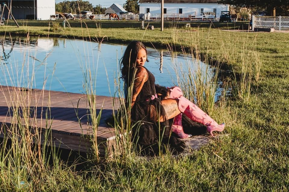 Styled portrait session on the pond dock at Parkton Place