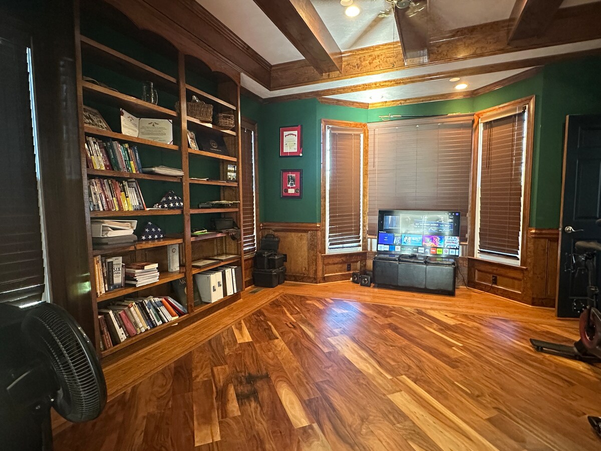 Cozy den with built-in bookshelves inside the Parkton Place home