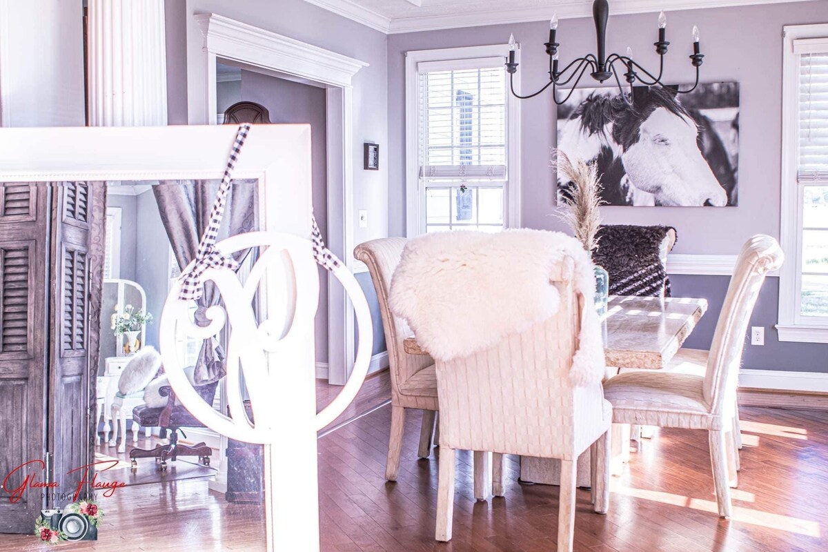 Elegant dining room with equestrian art at Parkton Place